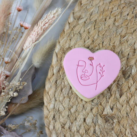 Floral face - impressed